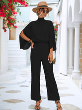 Load image into Gallery viewer, Black Tie Back Mock Neck Split Sleeve Jumpsuit
